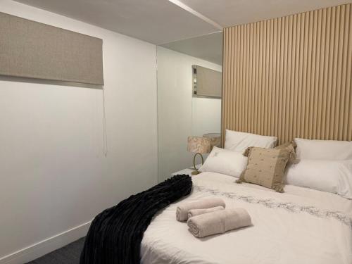 BinaApartment2 tesisinde bir odada yatak veya yataklar