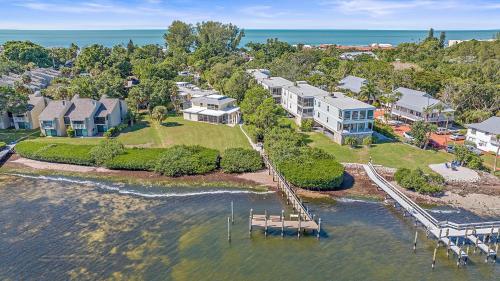 an aerial view of a house on an island in the water at Just Beachy in Longboat Key