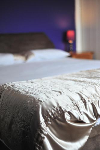 Кровать или кровати в номере Beinn Edra House B&B