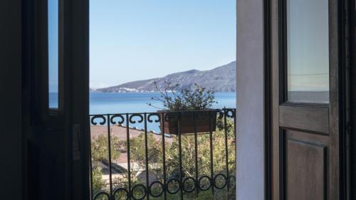 a view of the ocean from a balcony at Boutique Hotel I Cinque Balconi in Santa Marina Salina