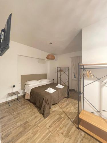 Postel nebo postele na pokoji v ubytování 2Effe Circeo B&B