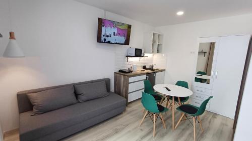 Good Place Apartmanにあるテレビまたはエンターテインメントセンター