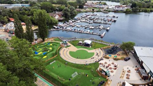 an aerial view of a marina with a bunch of boats at Cosy cabin for 6 in Great Billing in Great Billing