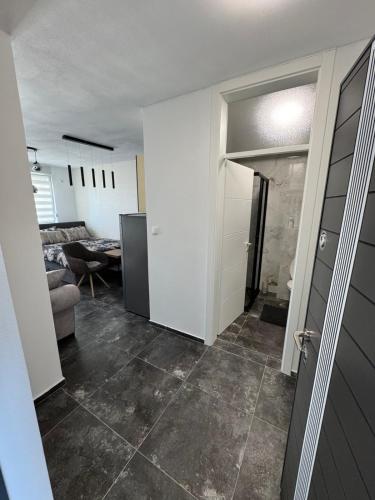Η κουζίνα ή μικρή κουζίνα στο Apartman CITY CENTER 2