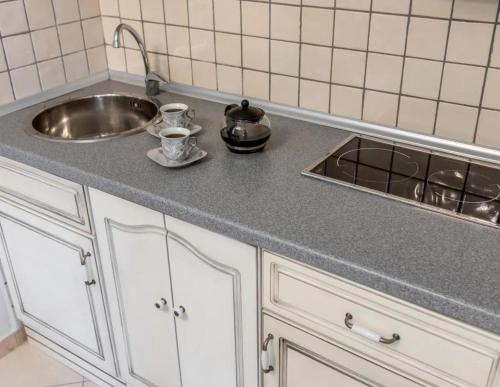 Η κουζίνα ή μικρή κουζίνα στο Villa Favorite