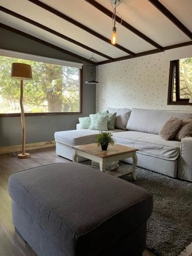 Afbeelding uit fotogalerij van Chalet op park met prive water in Hoevelaken in Hoevelaken