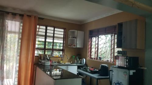 Kuchyň nebo kuchyňský kout v ubytování Kio Farm Retreat