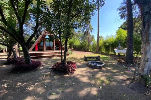 Zahrada ubytování Capital O Hotel La Huerta Golf & Hotel, Cholula