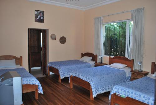 Postel nebo postele na pokoji v ubytování Travellers Inn
