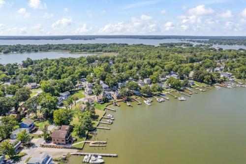 an aerial view of a lake with boats docked at Waterfront Getaway - Dock UR Boat & Walk to Beach in Annapolis