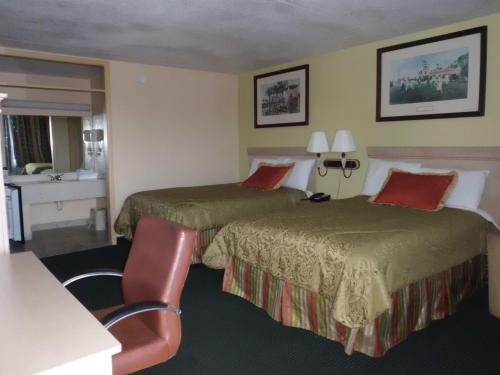 Gulta vai gultas numurā naktsmītnē America's Best Inn & Suites-Lakeland