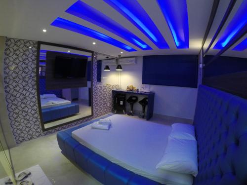 Postel nebo postele na pokoji v ubytování Motel Glamour