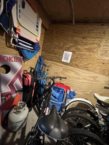 a group of bikes parked in a room at Waterfront luxury w-beach resort-pool-golf-tennis-fishing & views! in Nags Head