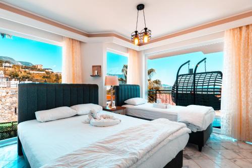 Postel nebo postele na pokoji v ubytování alanya polat holiday village