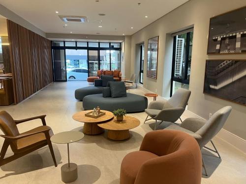 Coin salon dans l'établissement Suíte hotel Aeroporto Congonhas UH-803
