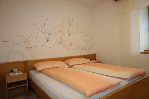 Postel nebo postele na pokoji v ubytování Apartment Norma