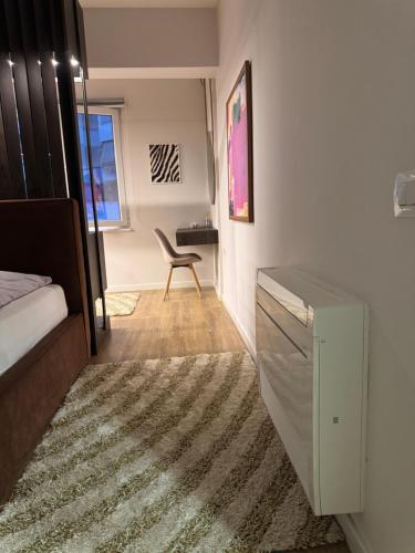 Postel nebo postele na pokoji v ubytování Govi Apartment al pieno centro di Tirana