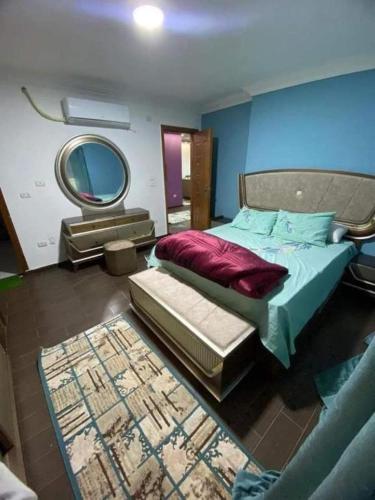 Llit o llits en una habitació de الزئبق فارم