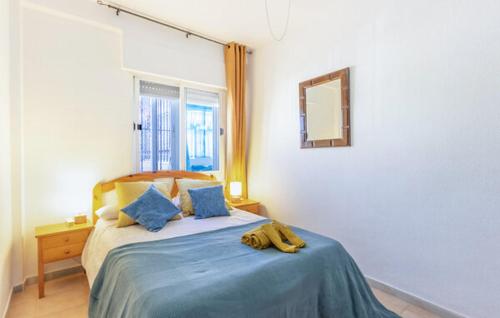 a bedroom with a bed with bananas on it at Casa Jana in Los Alcázares