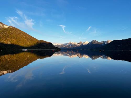 a view of a lake with mountains in the background at Bergpanorama in Sankt Gilgen
