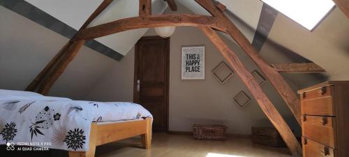 Postel nebo postele na pokoji v ubytování La ferme des gribouts