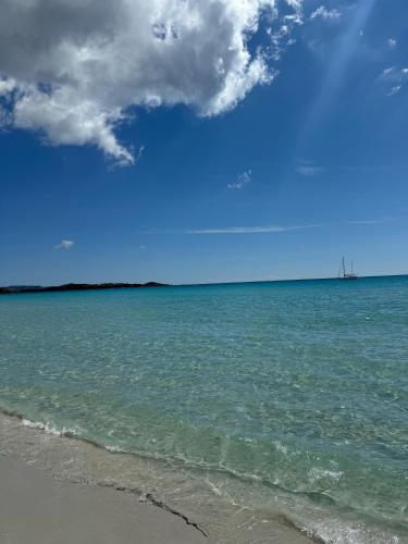 a view of the ocean from the beach at Magnolia Home in San Teodoro