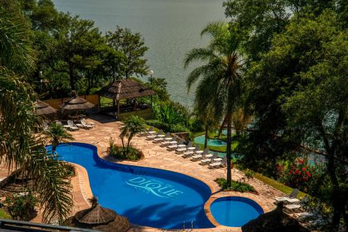 an image of a swimming pool at a resort at Hotel Del Dique in Coronel Moldes