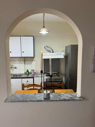 Η κουζίνα ή μικρή κουζίνα στο REMA Guesthouse Monemvasia