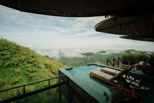 a swimming pool with a view of a mountain at Casa Malva Villas in Buenavista