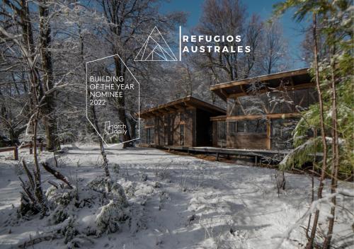 a log cabin in the woods in the snow at Refugios Australes en Corralco in Malalcahuello