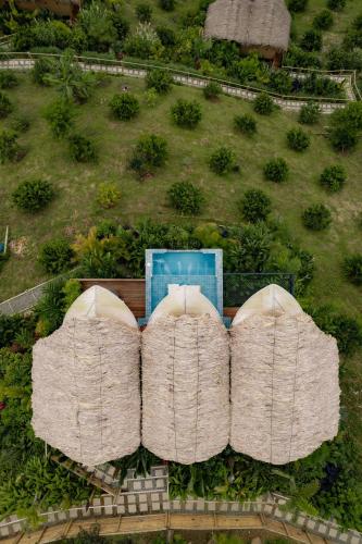 an overhead view of a building with three large pillows at Casa Malva Villas in Buenavista