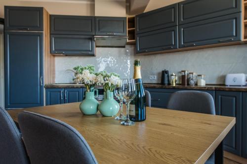 Kuchyň nebo kuchyňský kout v ubytování Zloty Wschód - Apartamenty Darłówko