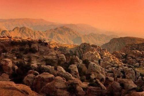 a view of a rocky mountain with mountains in the background at Dana's scenic trails in Dana