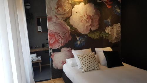 Postel nebo postele na pokoji v ubytování 13 suites