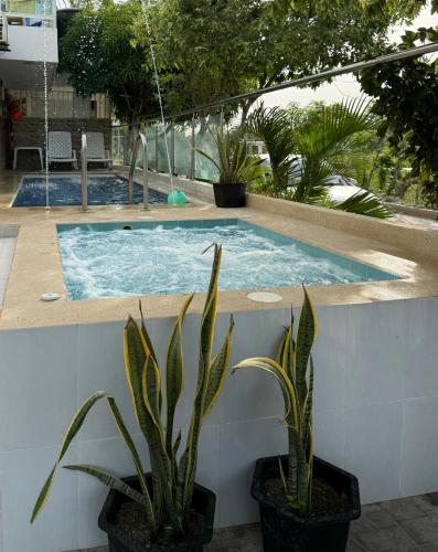 Πισίνα στο ή κοντά στο Apartahotel Eden Coveñas