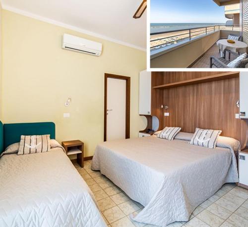 a hotel room with two beds and a balcony at Hotel Bamby e Delfino in Gatteo a Mare