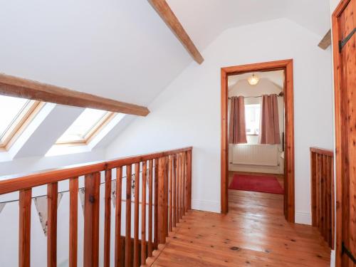 a staircase in a house with skylights at Hafod in Llanllyfni