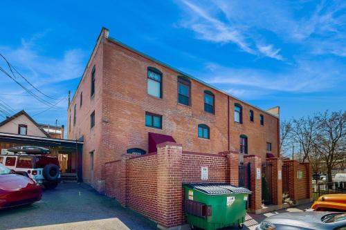 a brick building with cars parked in front of it at Jarvis #301 in Durango