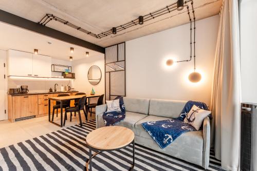 Η κουζίνα ή μικρή κουζίνα στο LOFT MARINE Green Port Basen & Sauny & fitness nielimitowany dostęp