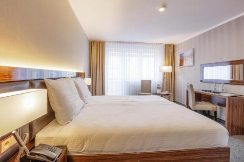 Hotel Wenedaにあるベッド