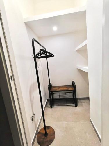 a stairway with a bench in a room at La Storia Moderna in Dolceacqua