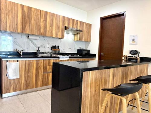 Lovely space in Cancúnにあるキッチンまたは簡易キッチン