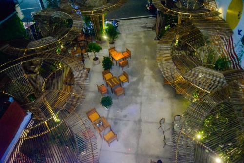 an overhead view of a park with benches and trees at Happy Bear Hostel Phu Quoc in Phu Quoc