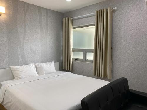 Postel nebo postele na pokoji v ubytování Juna hotel