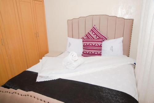 เตียงในห้องที่ Cutie homes