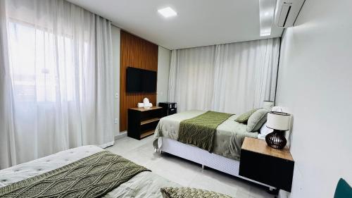 Ένα ή περισσότερα κρεβάτια σε δωμάτιο στο Pousada Casa Libertas