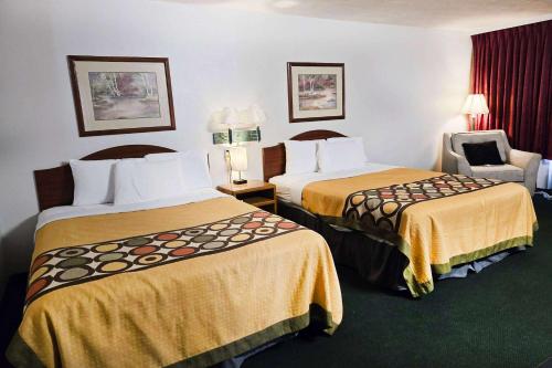 Ein Bett oder Betten in einem Zimmer der Unterkunft Travelodge by Wyndham Oakley