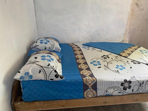Postel nebo postele na pokoji v ubytování Hostal el peñón