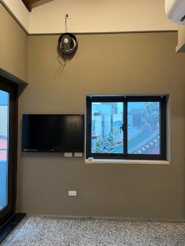 TV a/nebo společenská místnost v ubytování Fu Yu