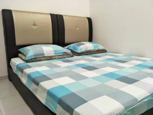 Ένα ή περισσότερα κρεβάτια σε δωμάτιο στο Cozy Stay at Mesahill - 2 Queen Beds by Ahmed